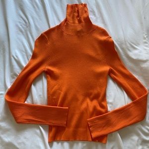 Bright orange turtleneck great for fall, Halloween 🧡🎃